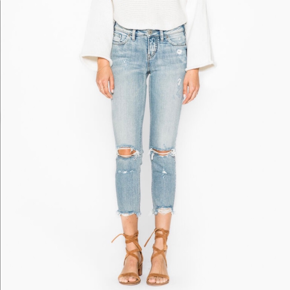 Silver Aiko slim crop distressed jeans.